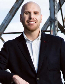 Headshot of Sean Carleton (He, him) border=